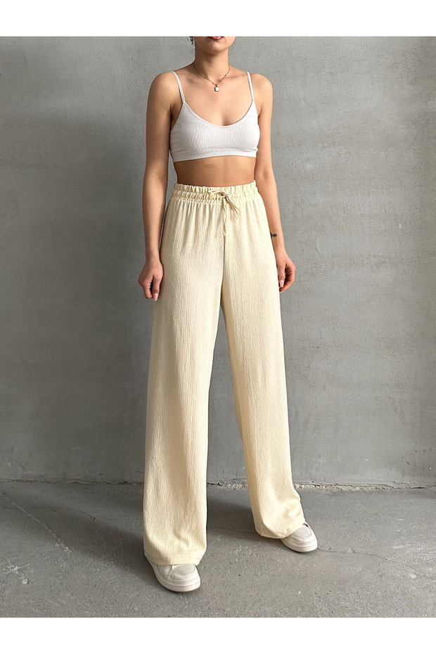 Dámské krémové kalhoty Palazzo s elastickým pasem - 5