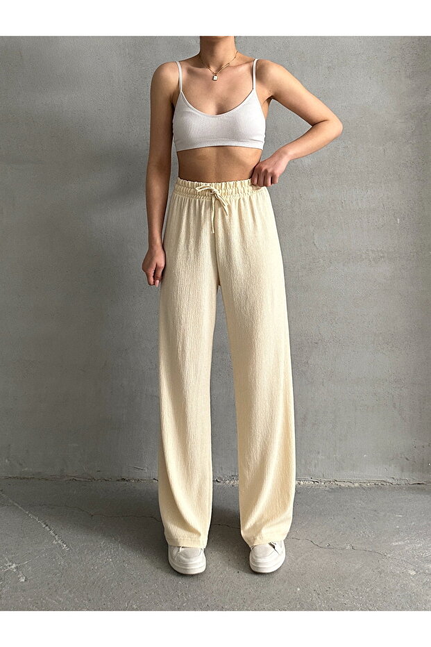 Dámské krémové kalhoty Palazzo s elastickým pasem - 1