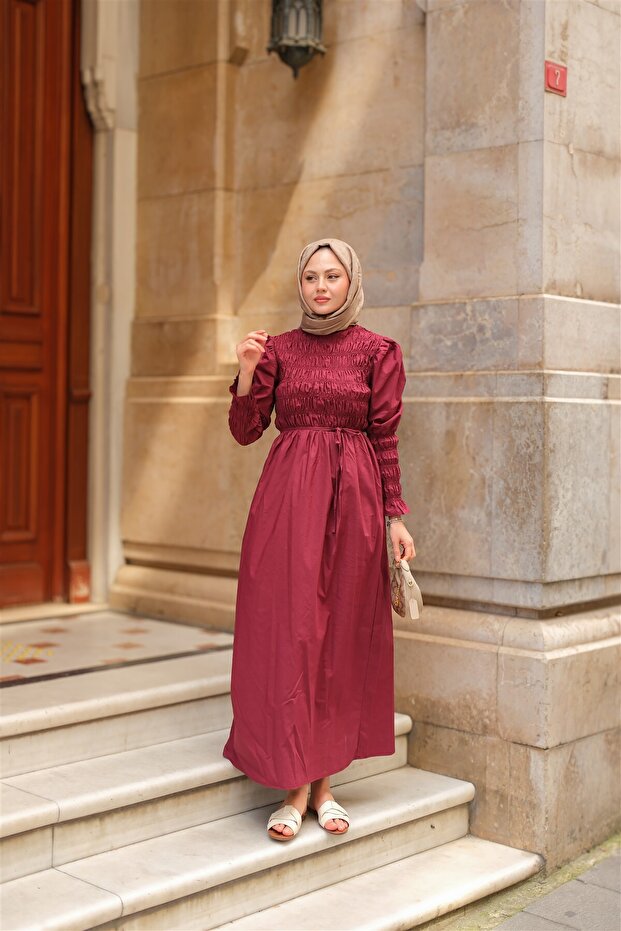 Woman's gipeli dress in burgundy
