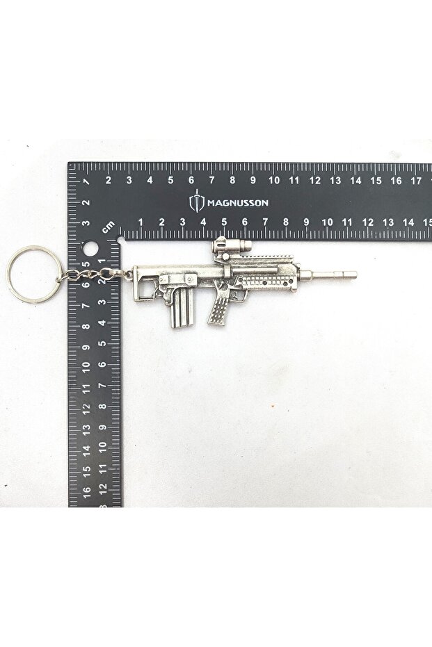 سلسلة مفاتيح على شكل مسدس - 1
