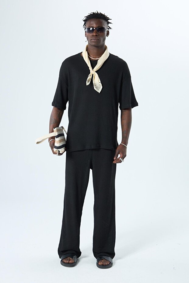 بدلة أساسية كبيرة الحجم باللون الأسود - 7