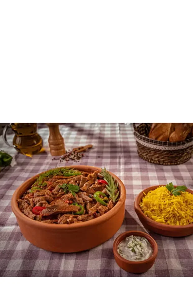 Solid clay casserole that can withstand direct and indirect heat, whether in the oven or on a flame. - 1