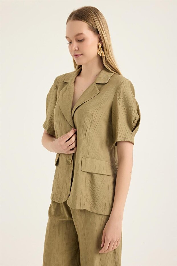 سترة قصيرة الأكمام - 2