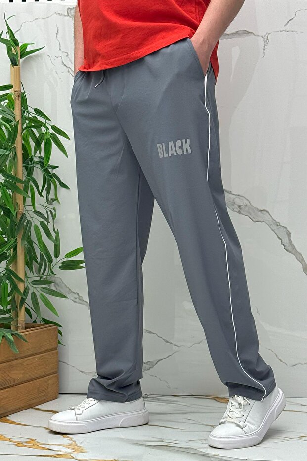 Men's Reflective Printed Parachute Fabric Baggy Trousers with Piping on the Sides