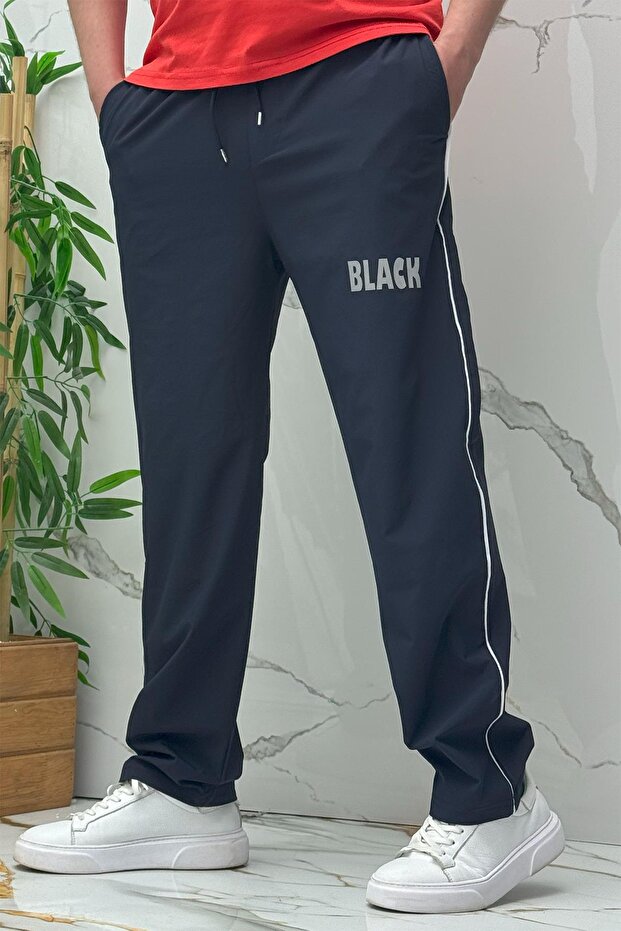 Men's Reflective Printed Parachute Fabric Baggy Trousers with Piping on the Sides