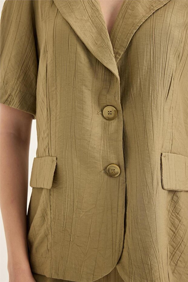 سترة قصيرة الأكمام - 4