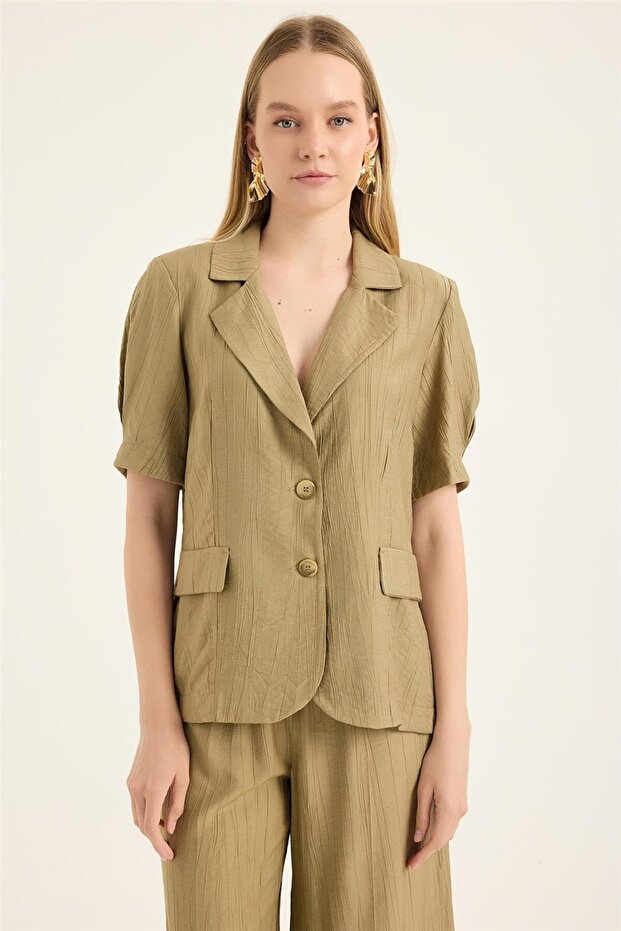 سترة قصيرة الأكمام - 1