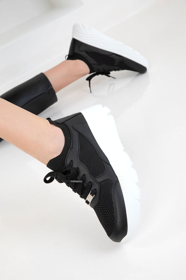 Schwarzer Damen-Sneaker 20628 - 4