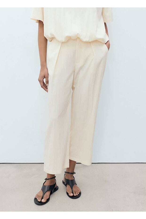 Kısa paçalı dökümlü pantolon - 1