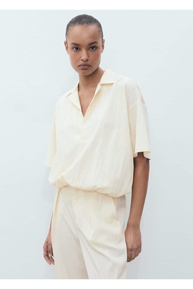 Kısa paçalı dökümlü pantolon - 7