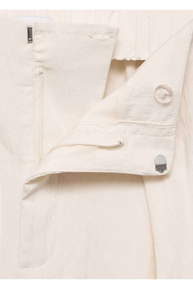 Kısa paçalı dökümlü pantolon - 5