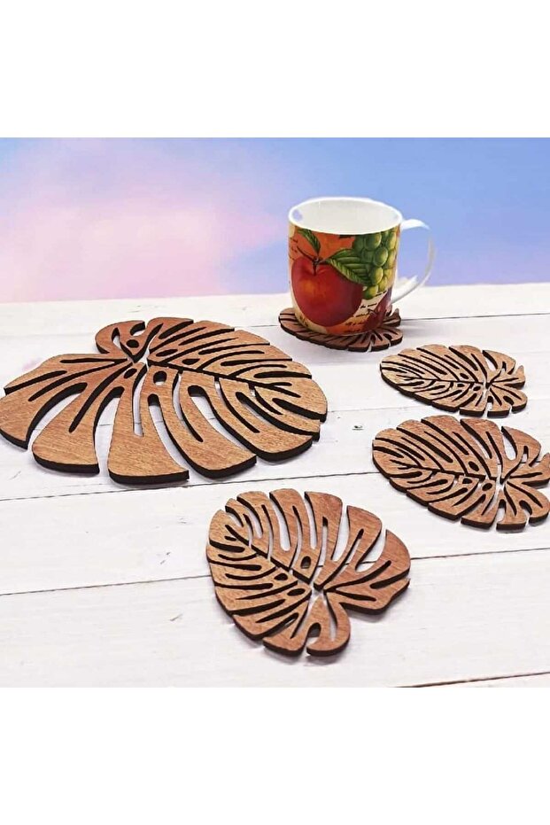 مجموعة قواعد أكواب خشبية منقوشة بأوراق Monstera - 1