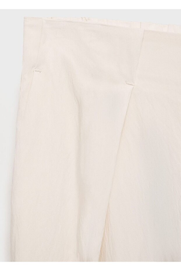 Kısa paçalı dökümlü pantolon - 6