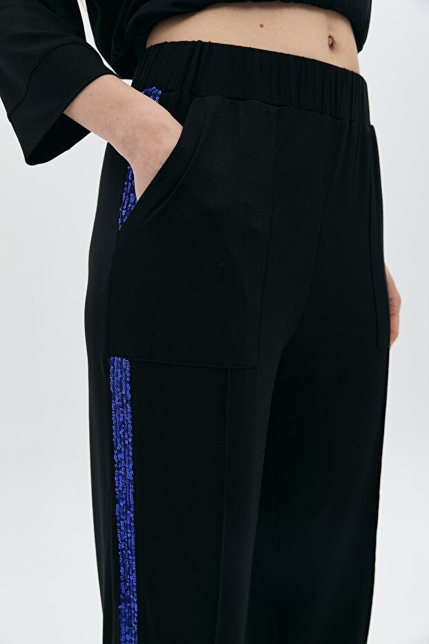 بنطال مخطط بالترتر الجانبي - 3