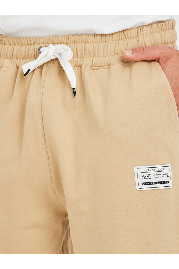 بنطال رياضي كبير الحجم مطبوع برباط - 3