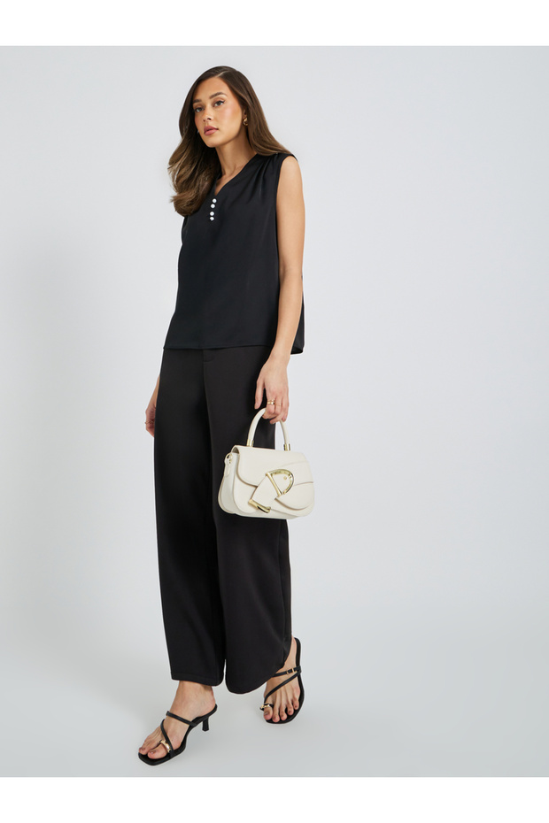 بلوزة سادة بدون أكمام بأزرار أمامية - 2