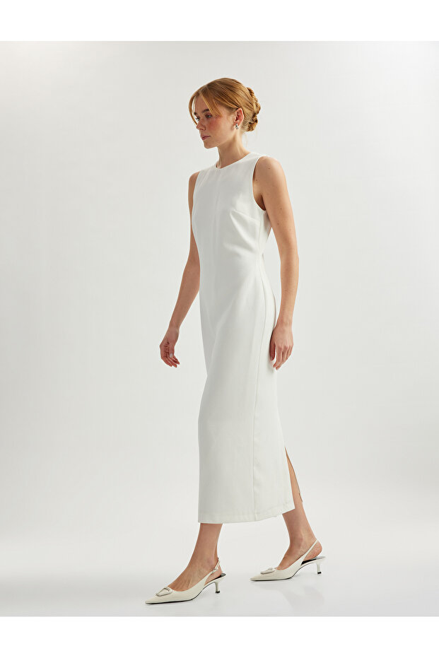 Sleeveless crew neck midi pencil dress.