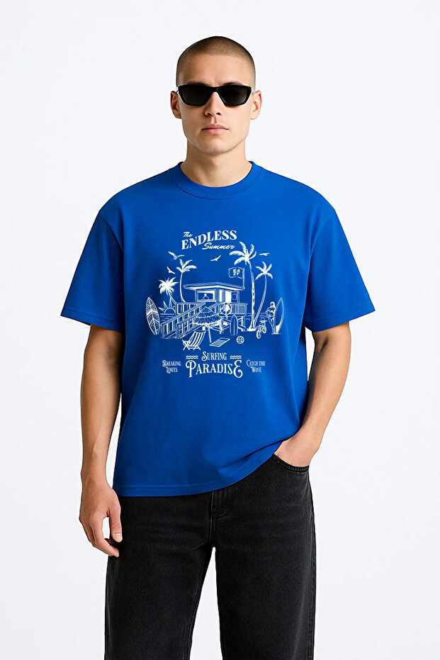 تي شيرت Surfing Paradise Saks Blue للجنسين بأكمام قصيرة مقاس كبير جدًا