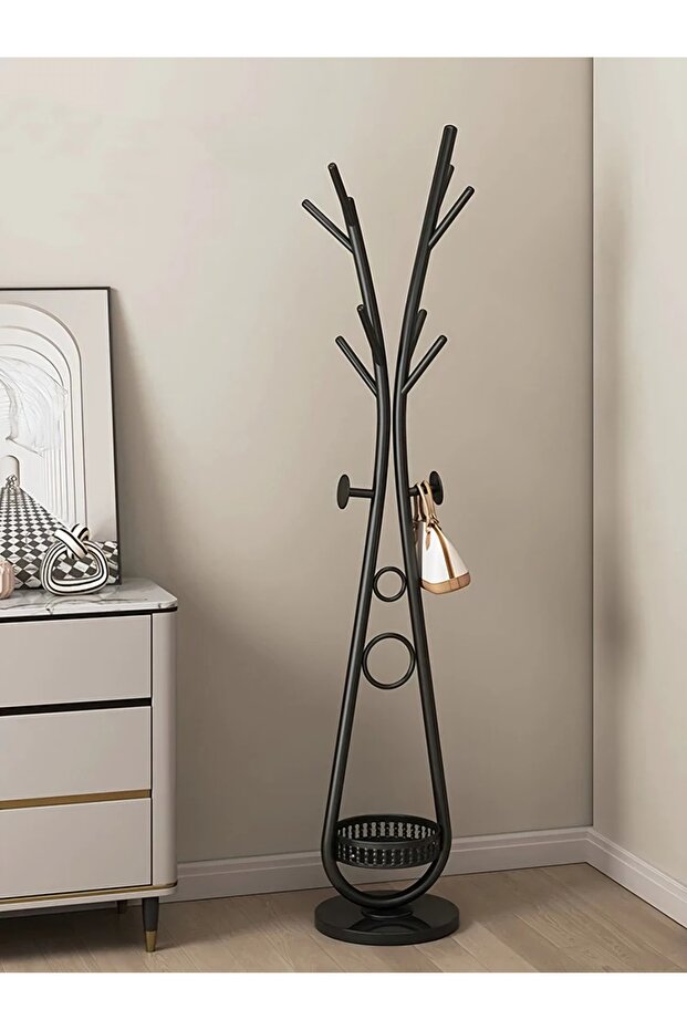 Modern clothes hanger with elegant artistic design and practical storage base - 3