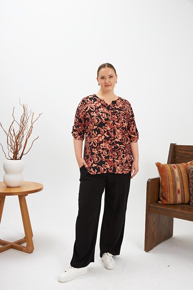 بلوزة كبيرة الحجم منقوشة بالزهور باللون الأسود - 6