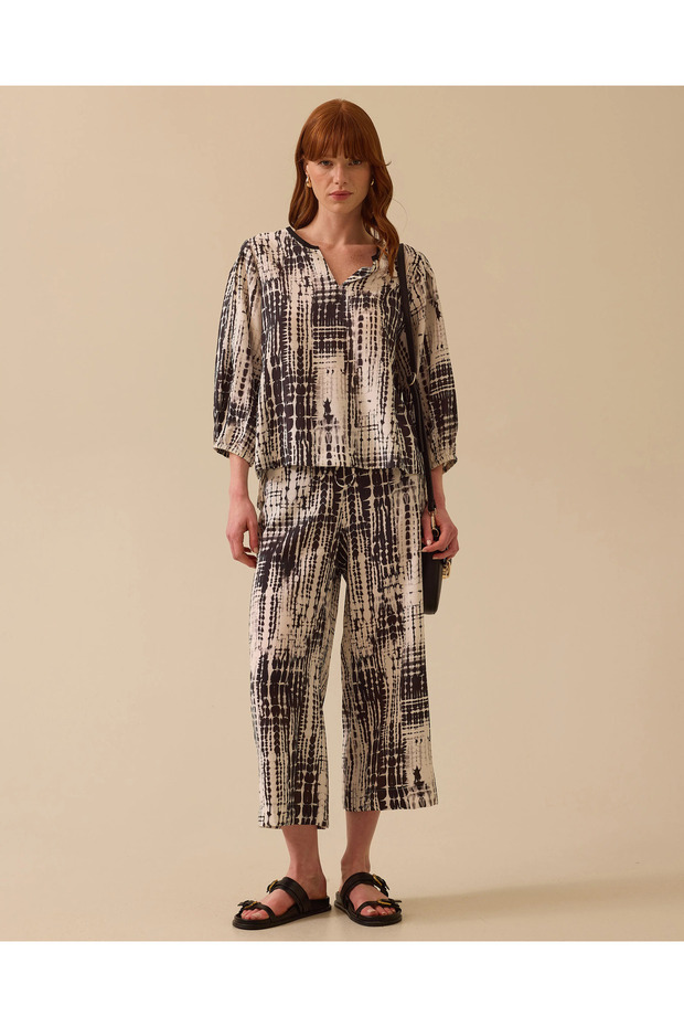 بنطلون منقوش بطول الكاحل - 1