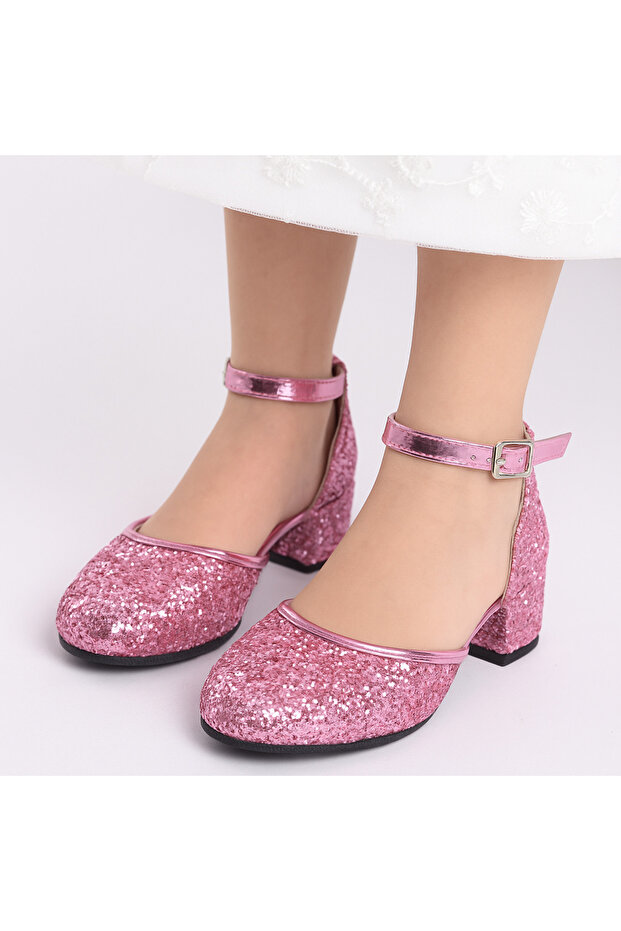 Pink glass broken girl's high heeled shoe