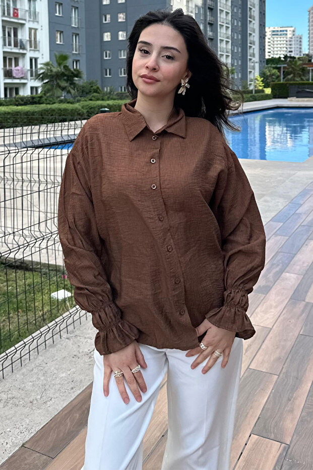قميص بأكمام مجمعة