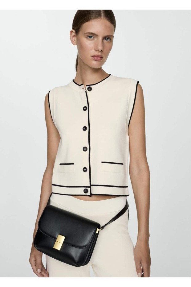 Sweater vest with contrasting stripes