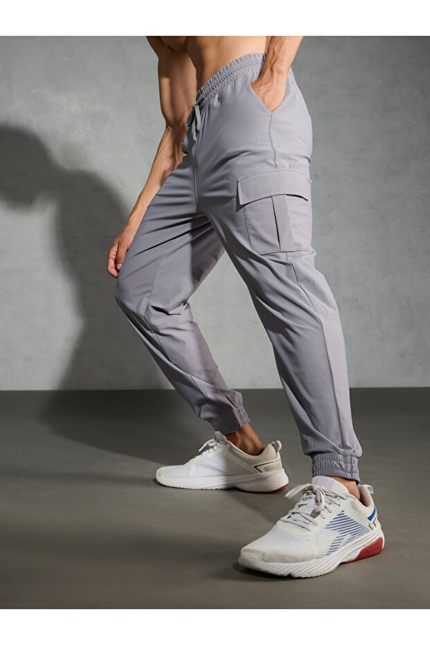 بنطال رياضي كارجو سادة بقصّة عادية مع رباط - 5