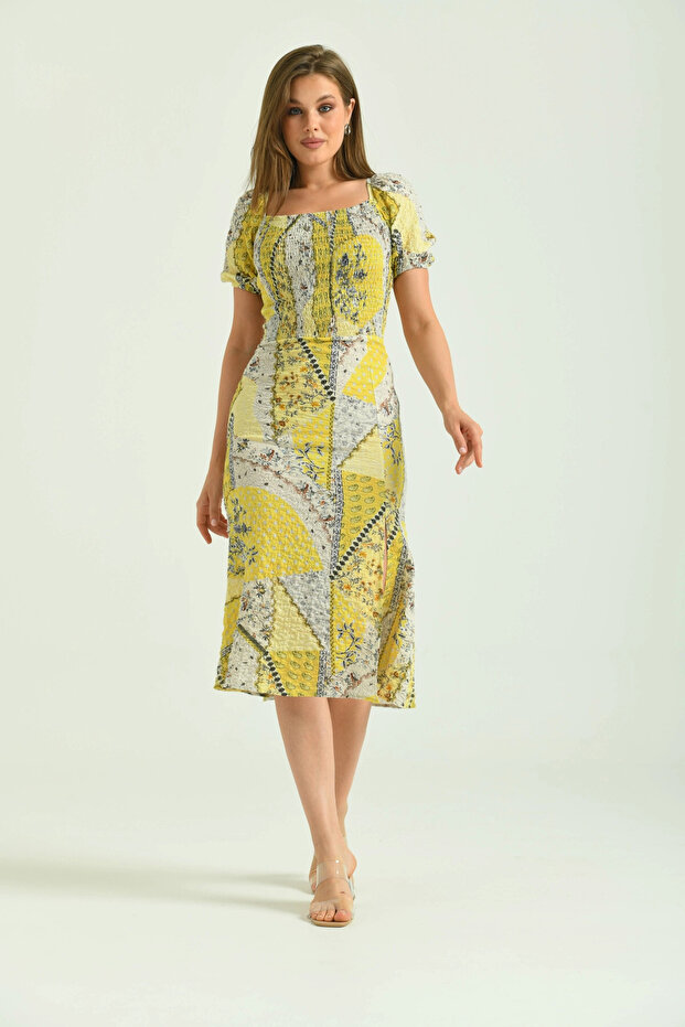 فستان صيفي منقوش بفتحة رقبة على شكل حرف V - 2