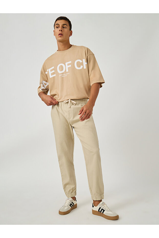 بنطال رياضي مريح سادة بأكمام مرنة ورباط - 2