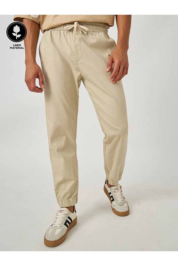 بنطال رياضي مريح سادة بأكمام مرنة ورباط - 1