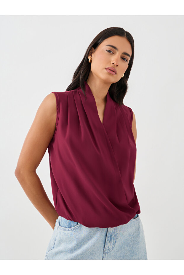 بلوزة سادة بدون أكمام ورقبة دائرية - 1