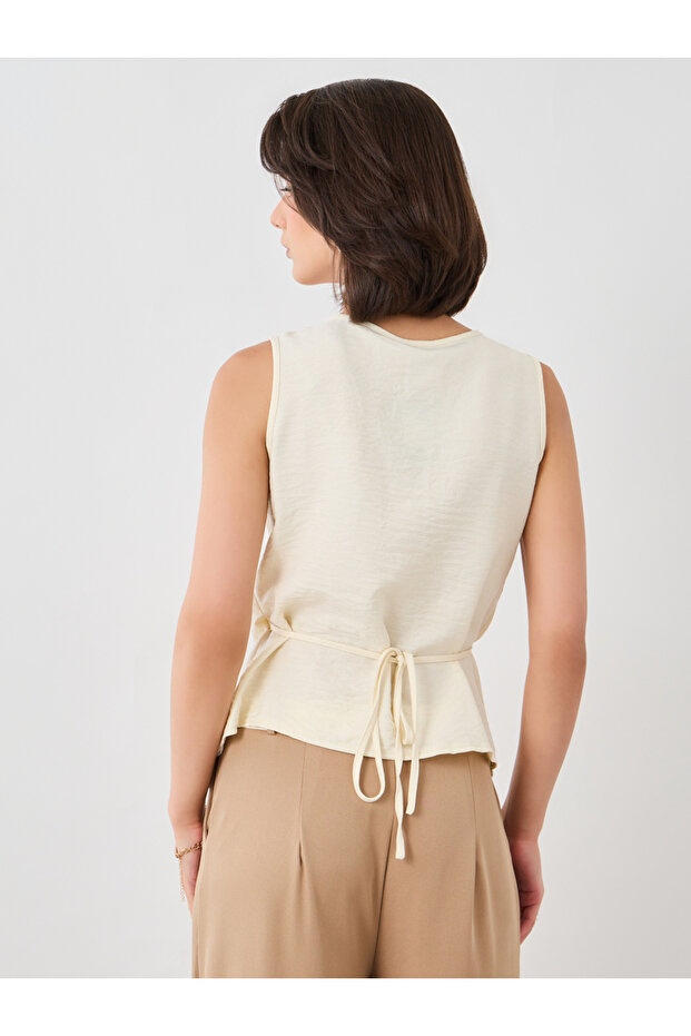 Solid Sleeveless Buttoned Wrap Top - 4