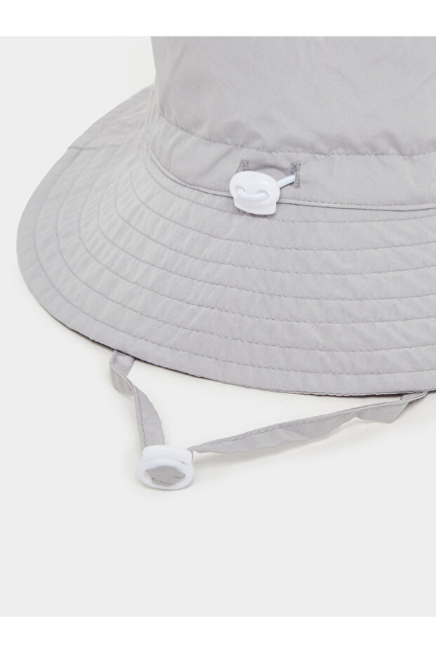 Solid Bucket Hat with Badge Details - 5