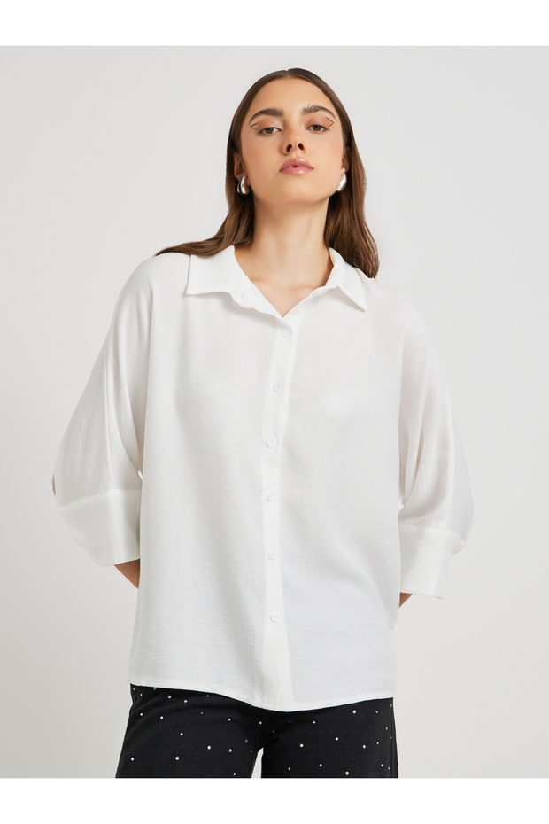 قميص كبير الحجم بياقة واسعة سادة - 1