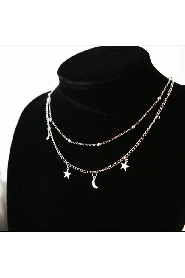Enhance Your Sparkle with the Stylish Moon and Star Motif Necklace