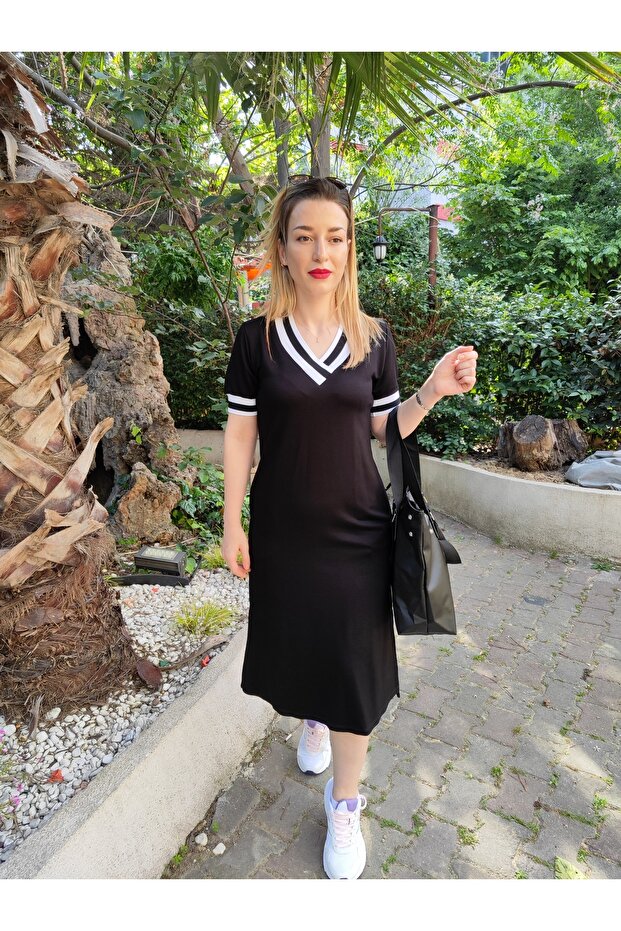 فستان أسود بفتحة - 2