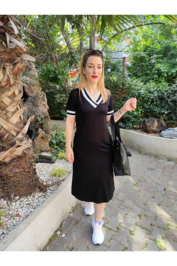 فستان أسود بفتحة - 4