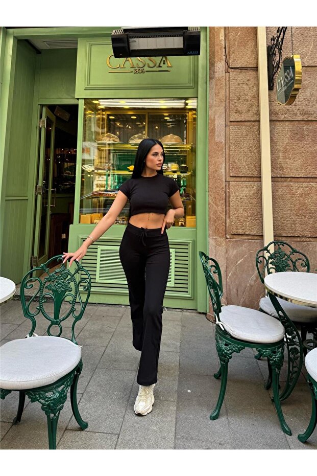 بدلة قصيرة من البولي أميد والإيلاستين باللون الأسود - 5