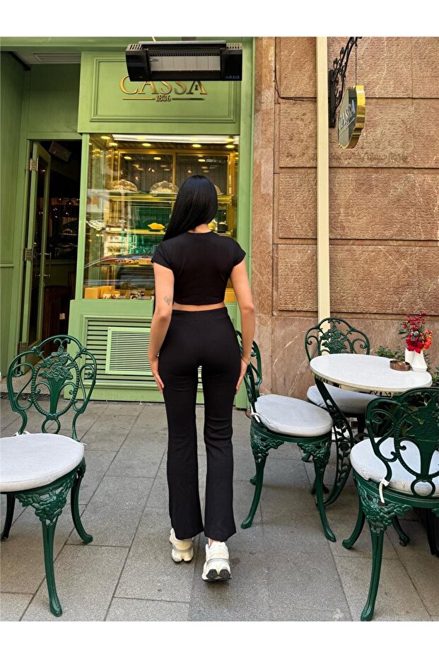 بدلة قصيرة من البولي أميد والإيلاستين باللون الأسود - 3