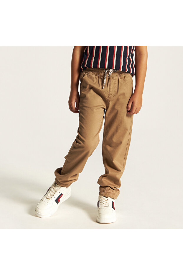 بنطال رياضي سادة متوسط ​​الارتفاع مع جيوب ورباط للإغلاق - 1