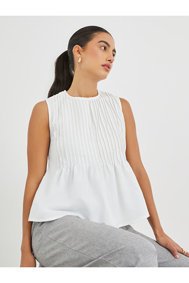 Pleated Peplum Ruffled Hem Top