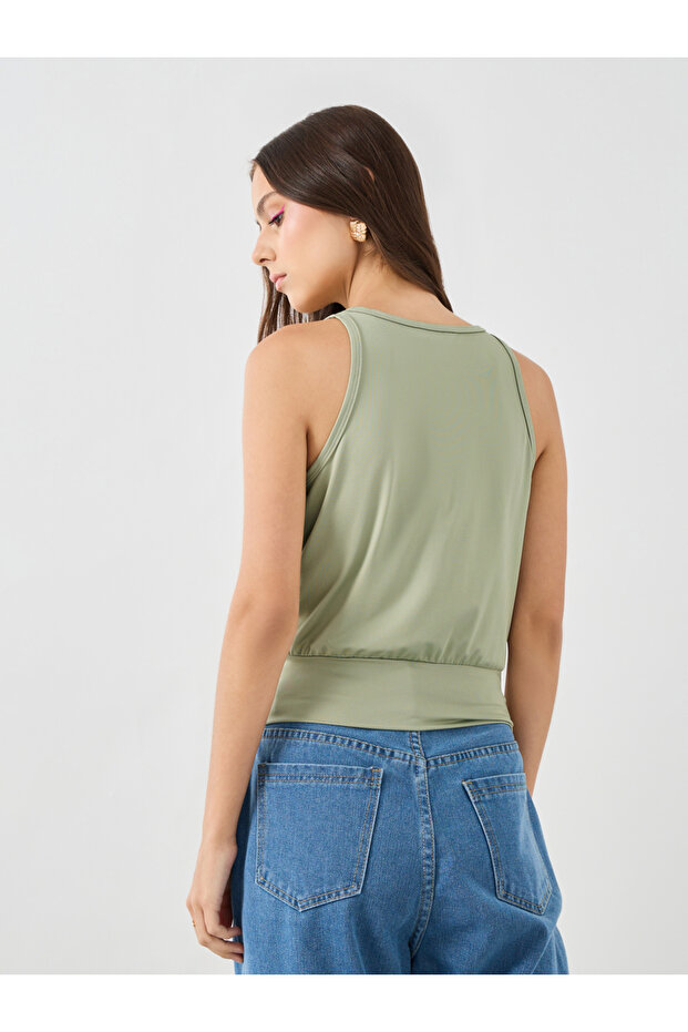 بلوزة سادة بدون أكمام برقبة دائرية - 4