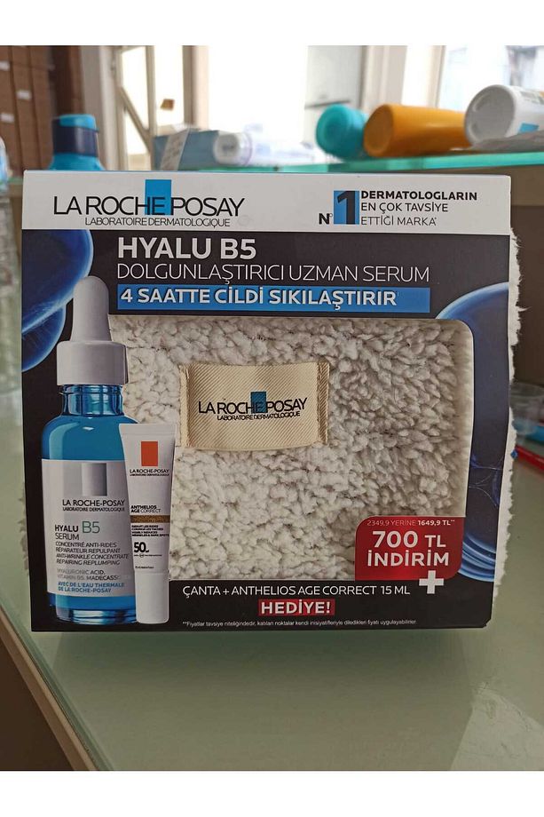 Hyalu B5 Serum 30 ml + Çanta + Anthelios Age Correct 15 ml - 1