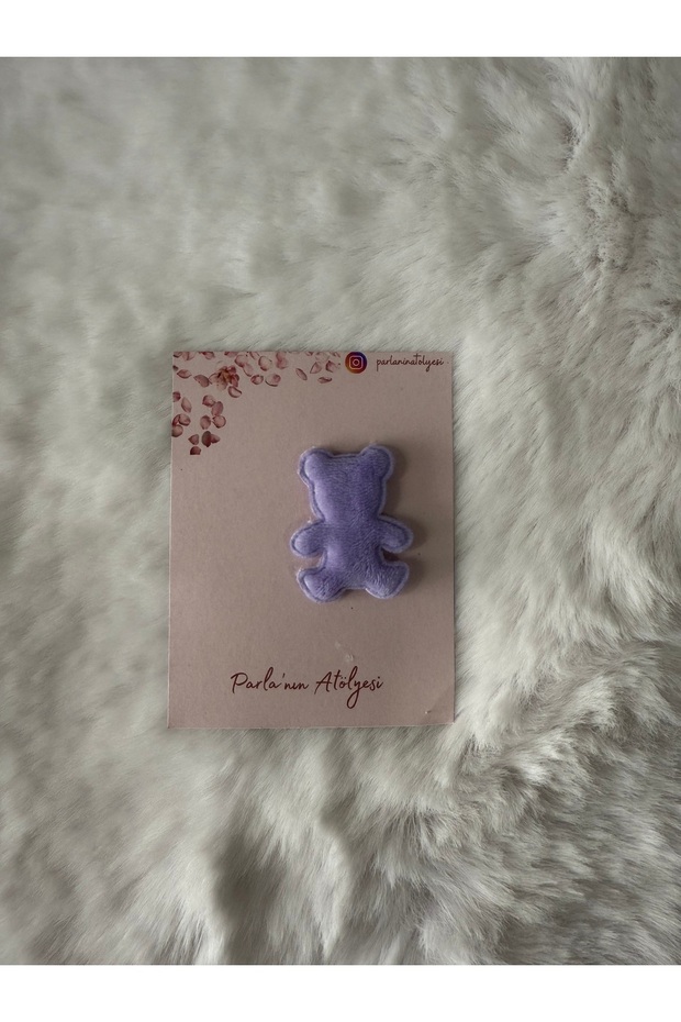 0-3 years old baby hair clip in the shape of a bear with and without hair.