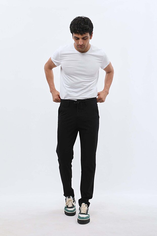 بنطال رياضي من مزيج مطاطي تقني - أسود - 6