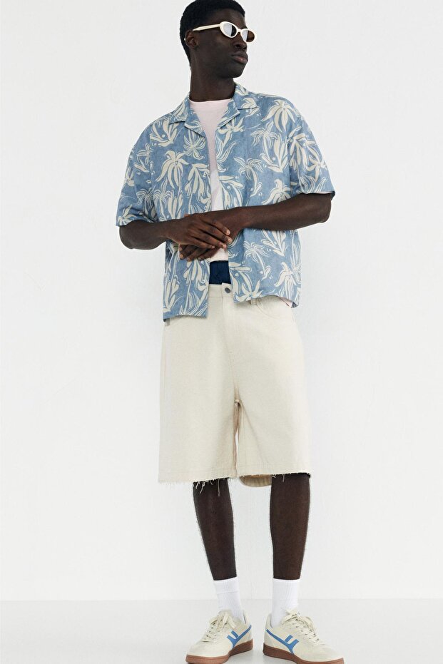 Mavi kısa kollu baskılı gömlek - 1