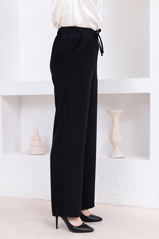 Linen pants with elastic waist and pockets - 3