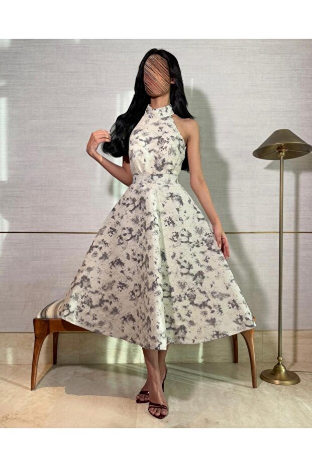 Off-white dress with gray patterns